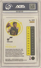 Load image into Gallery viewer, Walker Kessler [Asia Red] #529 2022 Panini Chronicles 29/48 AGS Graded 7
